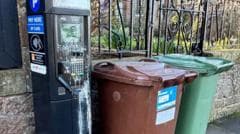 Battle over parking meters in sleepy seaside town sees machines glued shut